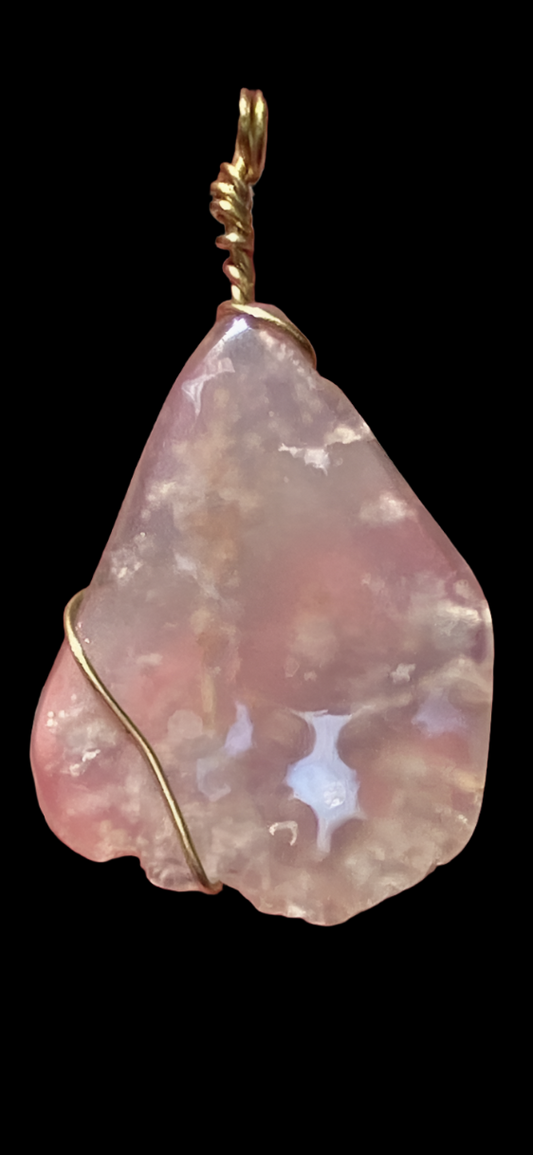 Beautiful clear transparent agate pendant with inclusions